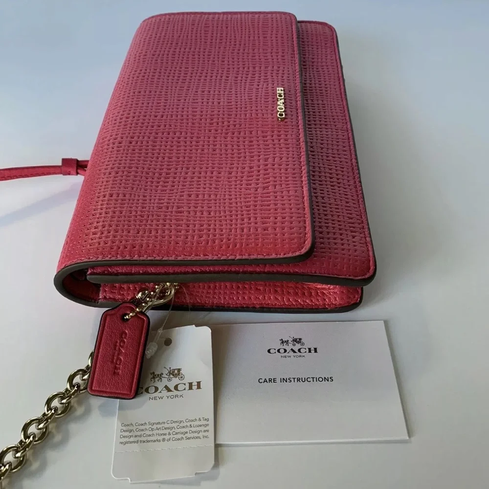 Coach details embossed